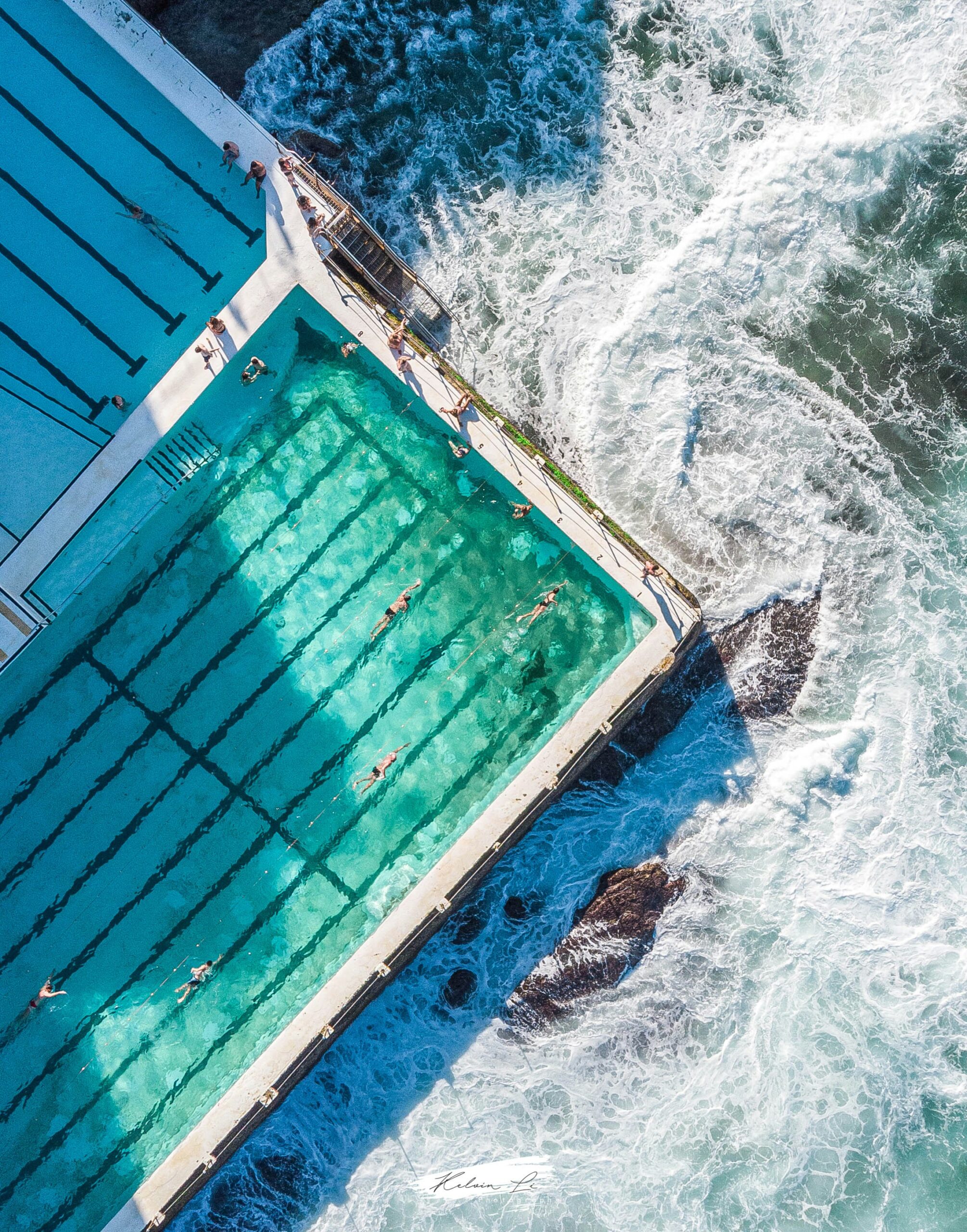Ocean pool beside breaking Pacific waves at Bondi in Sydney, Australia.
